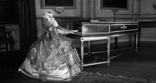 Headless Woman Playing Piano